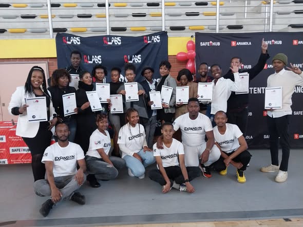 Group of DLab graduates at a certificate ceremony