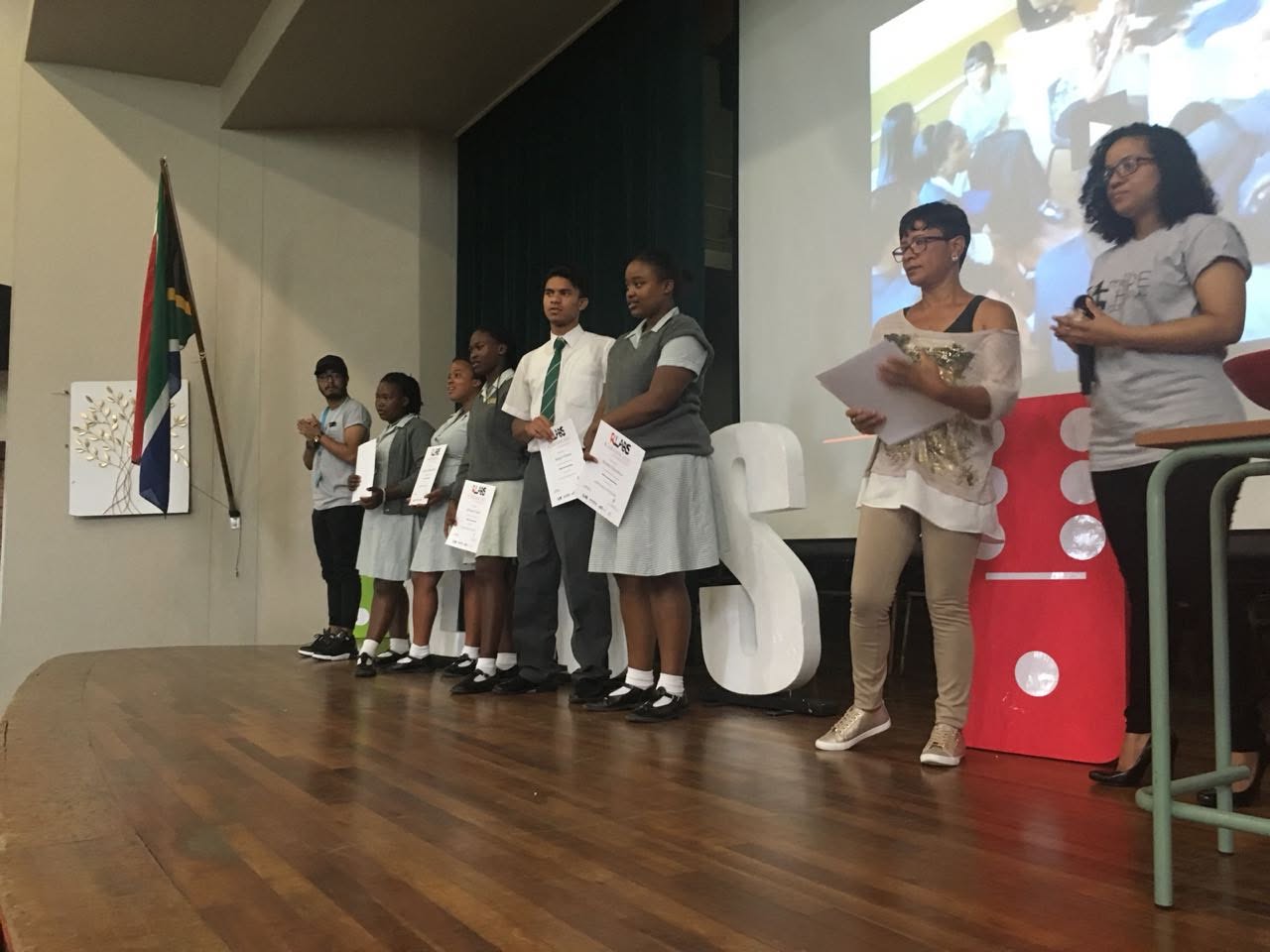 Students receiving certificates at Cape Town High School